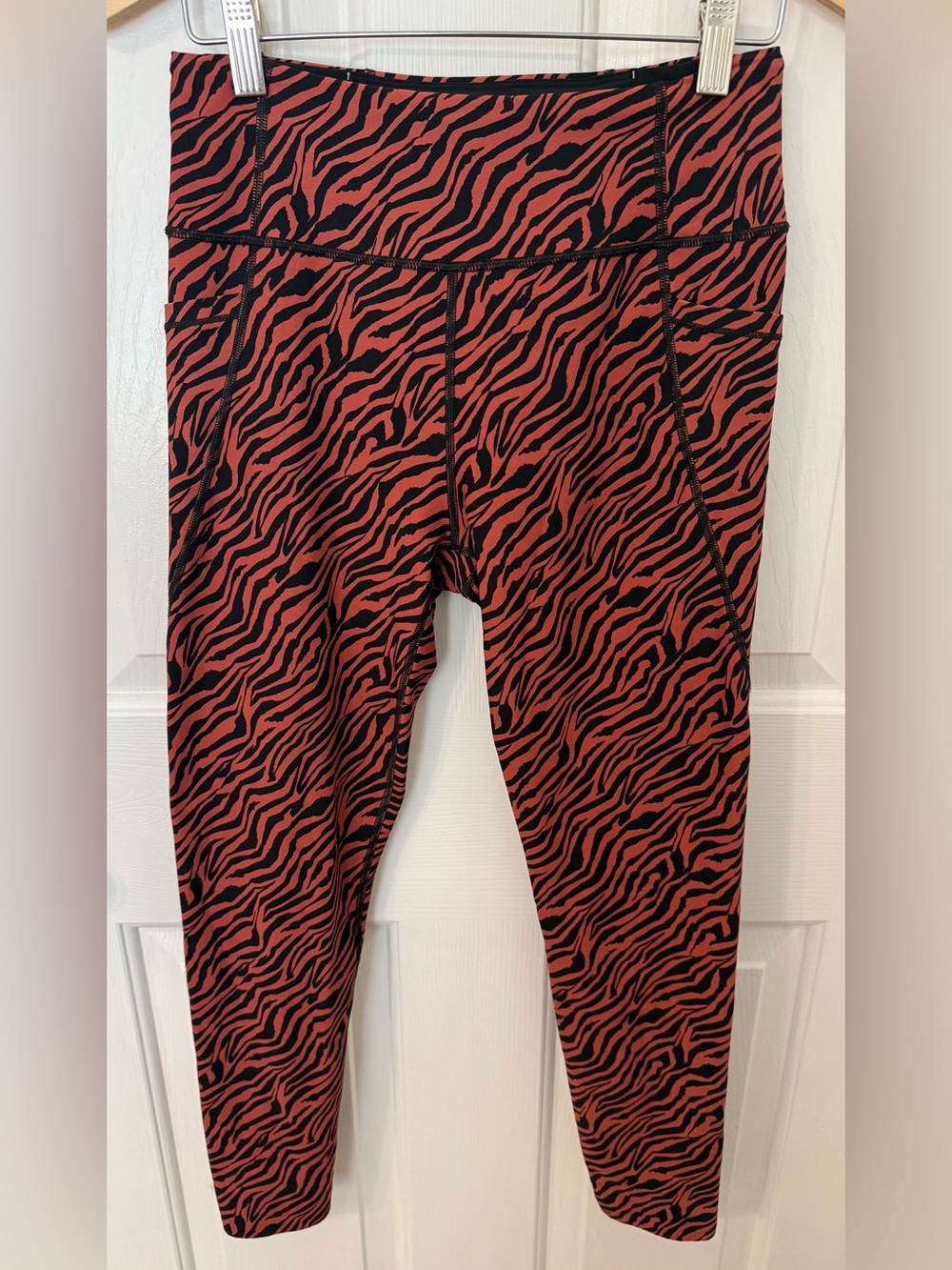 Victoria’s Secret Rust Orange & Black Zebra Print Leggings Size S